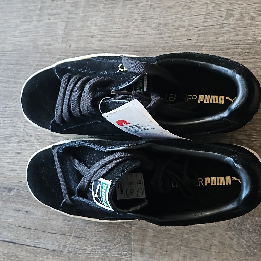 NWT. Puma Clyde,  men's shoes, size 8.5, color black